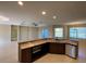 Spacious kitchen with island, stainless steel appliances, and granite countertops at 6 Transon Ln, Placida, FL 33946