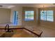 Bright dining area with large windows and tile flooring at 6 Transon Ln, Placida, FL 33946