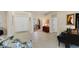 Elegant entryway with views into home office and living spaces at 15390 Ancel Cir, Port Charlotte, FL 33981