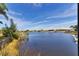 Scenic view of a tranquil canal, ideal for waterfront living at 15390 Ancel Cir, Port Charlotte, FL 33981