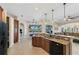 Modern kitchen with granite countertops and island at 15390 Ancel Cir, Port Charlotte, FL 33981