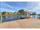 Covered boat lift and kayak on the dock at 15390 Ancel Cir, Port Charlotte, FL 33981