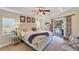 Spacious main bedroom with king-size bed and pool access at 15390 Ancel Cir, Port Charlotte, FL 33981