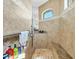 Large walk-in shower with built-in seat at 9303 Migue Cir, Port Charlotte, FL 33981