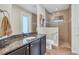 Bathroom with granite vanity and walk-in shower at 9303 Migue Cir, Port Charlotte, FL 33981