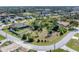Aerial view of vacant lot surrounded by beautiful homes in a waterfront community at 9303 Migue Cir, Port Charlotte, FL 33981