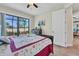Bedroom with queen bed and backyard access at 9303 Migue Cir, Port Charlotte, FL 33981