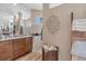 Elegant bathroom with double vanity and walk-in shower at 9303 Migue Cir, Port Charlotte, FL 33981