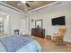 Main bedroom with rocking chair and ample space at 9303 Migue Cir, Port Charlotte, FL 33981