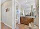 Guest bathroom with toilet and vanity at 9303 Migue Cir, Port Charlotte, FL 33981