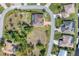 Bird's-eye view of a residential lot near canal and upscale homes at 9303 Migue Cir, Port Charlotte, FL 33981