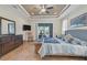 Spacious main bedroom with backyard access and large dresser at 9303 Migue Cir, Port Charlotte, FL 33981