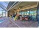 Outdoor entertainment area with covered patio, pool, and seating at 9303 Migue Cir, Port Charlotte, FL 33981