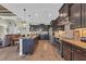 Open kitchen with large island and stainless steel appliances at 9303 Migue Cir, Port Charlotte, FL 33981