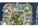 Aerial view of waterfront homes and a desirable lot available in a quiet neighborhood at 9303 Migue Cir, Port Charlotte, FL 33981