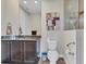 Bathroom with toilet and walk-in shower at 9303 Migue Cir, Port Charlotte, FL 33981