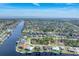 Aerial view of expansive waterfront community and canals at 9303 Migue Cir, Port Charlotte, FL 33981