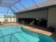 Expansive pool and patio with retractable sunshade at 9303 Migue Cir, Port Charlotte, FL 33981