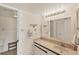 Clean bathroom features vanity sink, decorative lighting, and towel racks at 175 Kings Hwy # 1014, Punta Gorda, FL 33983
