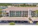 Condo with covered parking, colorful trim, and maintained landscaping at 175 Kings Hwy # 1014, Punta Gorda, FL 33983