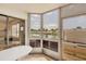 Enclosed lanai features serene lake views and tile floors at 175 Kings Hwy # 1014, Punta Gorda, FL 33983