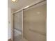 Shower stall with sliding glass doors and grab bar for accessibility at 175 Kings Hwy # 1014, Punta Gorda, FL 33983