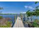 Private dock with access to the water, ideal for boating and fishing at 3 Pointe Way, Placida, FL 33946