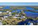 An aerial view of waterfront homes and peaceful waterways at 13044 Via Cassia, Placida, FL 33946