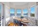 Charming breakfast nook with water views and built-in seating at 13044 Via Cassia, Placida, FL 33946