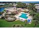 Relaxing community pool with ample lounge space at 13044 Via Cassia, Placida, FL 33946