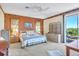 Spacious main bedroom with water views, access to deck and walk-in closet at 13044 Via Cassia, Placida, FL 33946