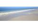 Expansive beach with gentle waves at 13044 Via Cassia, Placida, FL 33946