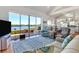 Relaxing living room with water views, hardwood floors, and comfortable seating at 13044 Via Cassia, Placida, FL 33946