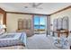 Main bedroom with deck access and water views at 13044 Via Cassia, Placida, FL 33946