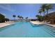 Inviting community pool overlooking the waterfront at 13044 Via Cassia, Placida, FL 33946