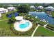 Kidney shaped resort-style pool with a gazebo at 13044 Via Cassia, Placida, FL 33946
