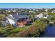 Elevated waterfront home with large deck overlooking the water at 13044 Via Cassia, Placida, FL 33946