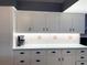 Kitchen boasts ample cabinetry and modern countertops at 8 Sportsman Ter, Rotonda West, FL 33947