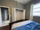Bedroom with walk-in closet and view of another room at 8 Sportsman Ter, Rotonda West, FL 33947