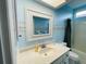 Bathroom with vanity and a beach-themed decor at 8 Sportsman Ter, Rotonda West, FL 33947