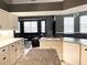 Spacious kitchen featuring ample cabinetry, granite countertops, and modern appliances at 8 Sportsman Ter, Rotonda West, FL 33947