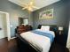 Bright bedroom featuring a double bed and ample closet space at 8 Sportsman Ter, Rotonda West, FL 33947