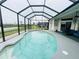 Spacious screened pool with a lake view at 8 Sportsman Ter, Rotonda West, FL 33947