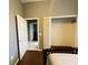 Bedroom with access to bathroom and walk-in closet at 8 Sportsman Ter, Rotonda West, FL 33947