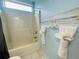 Bathroom with shower/tub combo and white tile flooring at 8 Sportsman Ter, Rotonda West, FL 33947