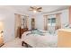 Bright bedroom featuring a comfortable bed with a turtle-themed comforter and light wood flooring at 1361 Newton St, Port Charlotte, FL 33952