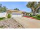 Brick driveway leading to a two car garage at 1361 Newton St, Port Charlotte, FL 33952