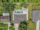 Directly above view of house, pool, and yard at 1361 Newton St, Port Charlotte, FL 33952