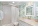 Guest bathroom with tropical wallpaper and shower/tub at 7536 Palm Island S Dr # 1511, Placida, FL 33946