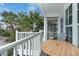 Balcony with small table and chairs and partial view of the complex at 7536 Palm Island S Dr # 1511, Placida, FL 33946